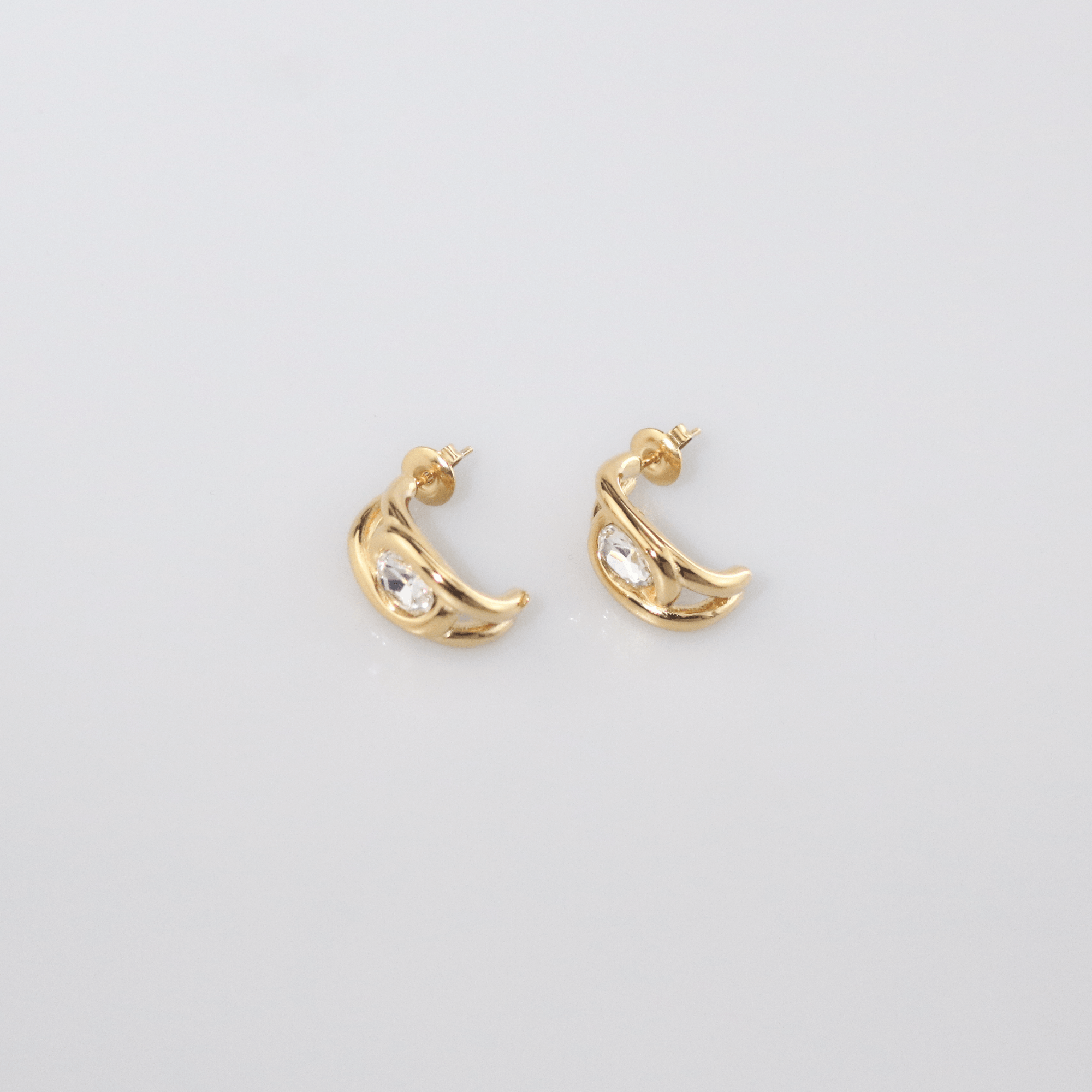 Aurelia CZ Huggie Earrings | 18k Gold Plated, Oval Solitaire 4