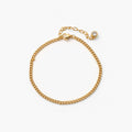 Cora Gold Anklet featuring an 18k gold plated adjustable curb chain adorned with a sparkling crystal charm. 0
