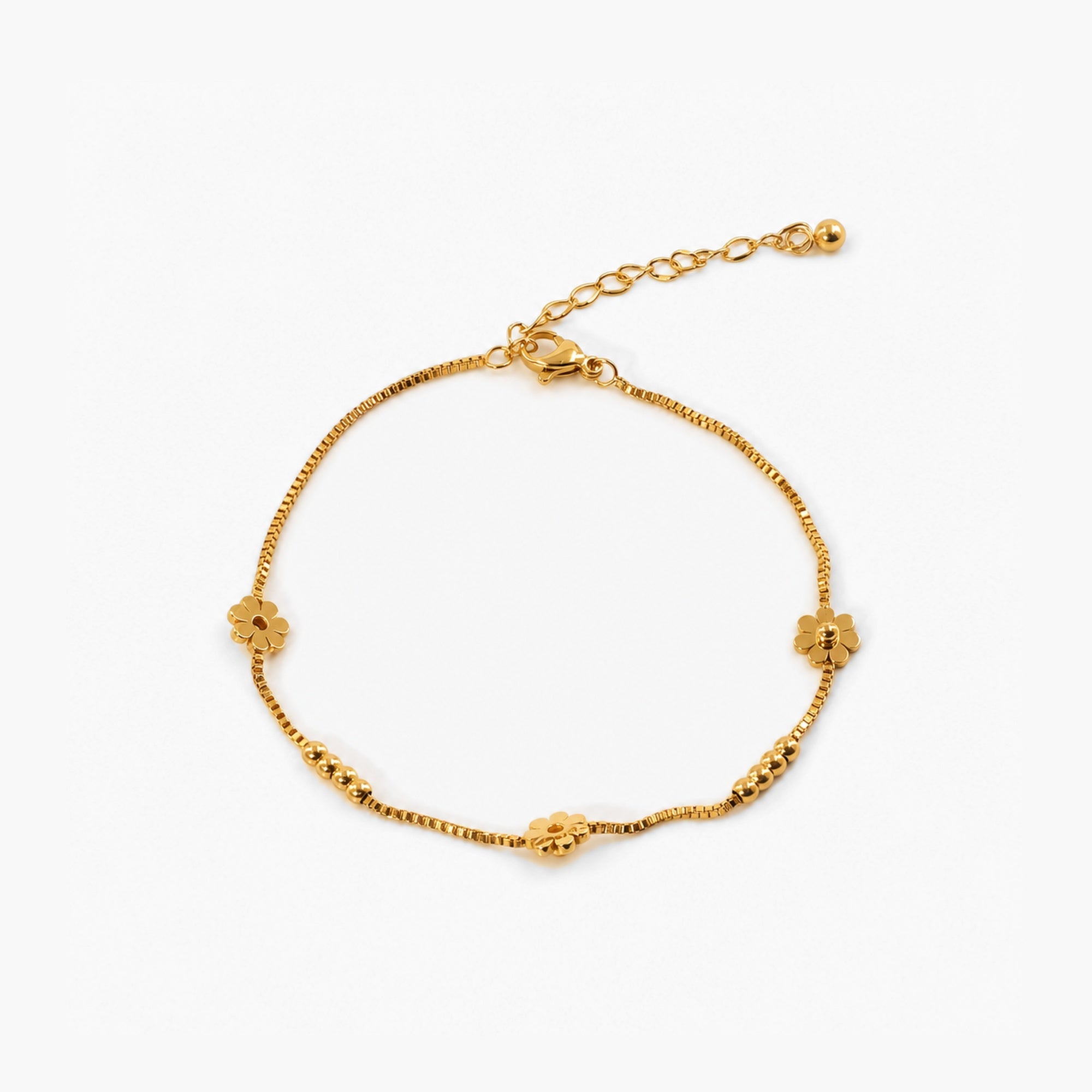 Dalia Daisy Chain Anklet in 18k gold plating, featuring a waterproof design and adjustable length for a perfect fit. 0