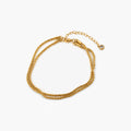 Dara Double Layer Anklet featuring an 18k gold plated, diamond-cut chain, designed for women seeking elegant and stylish ankle jewelry. 0