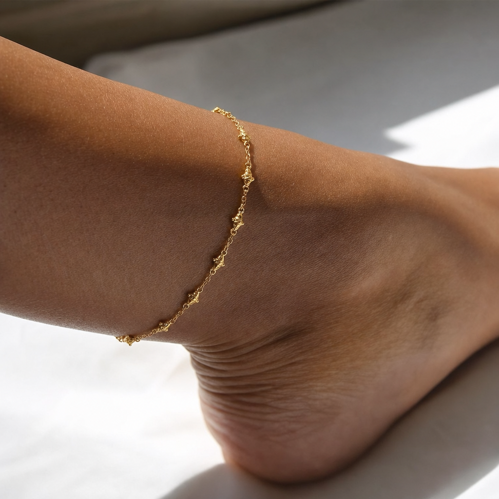 Fiora Fish Anklet for women, featuring 18k gold plating, adjustable design for a perfect fit

 1