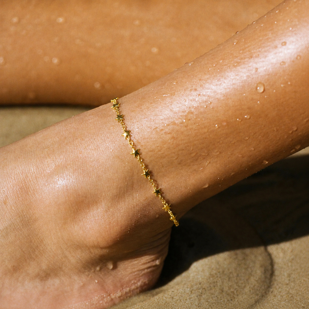 Sora Star Chain Anklet for women, featuring an elegant design in 18k gold plating, adjustable length for a perfect fit. 1
