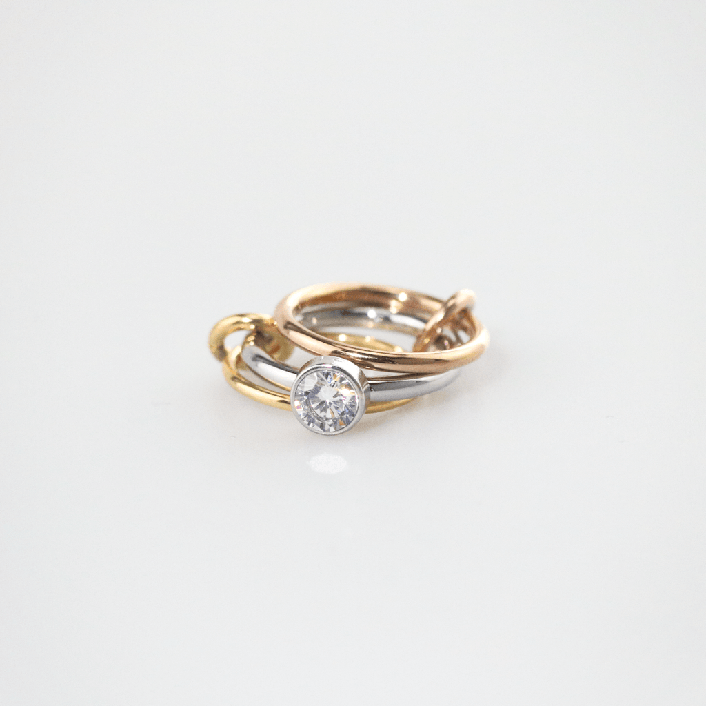 Trilia Solitaire Ring | Triple Metal Intertwined Bands 0