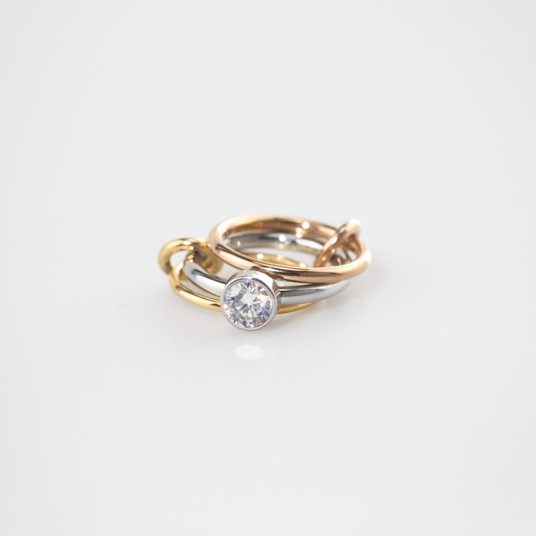 Trilia Solitaire Ring | Triple Metal Intertwined Bands 0